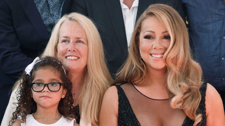 Mariah Carey, her mother, Patricia, and the star's daughter, Monroe, attend...