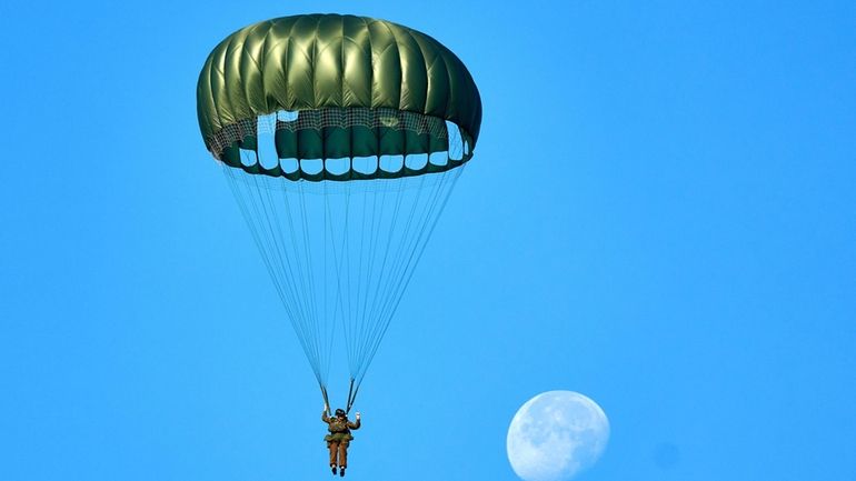 Parachutists jump over Ginkel Heath Netherlands, Saturday, Sept. 21, 2024,...