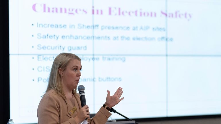 Tate Fall, director of Cobb County Elections, speaks during an...