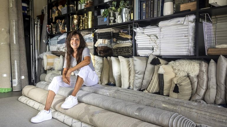 Lucille DeFina, owner of Staged Long Island, at her home garage...