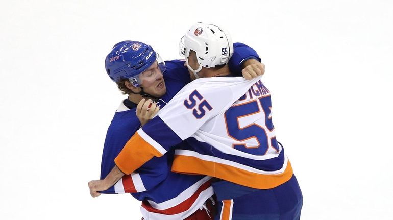 It looks like the Rangers' Brendan Lemieux and Islanders' Johnny...