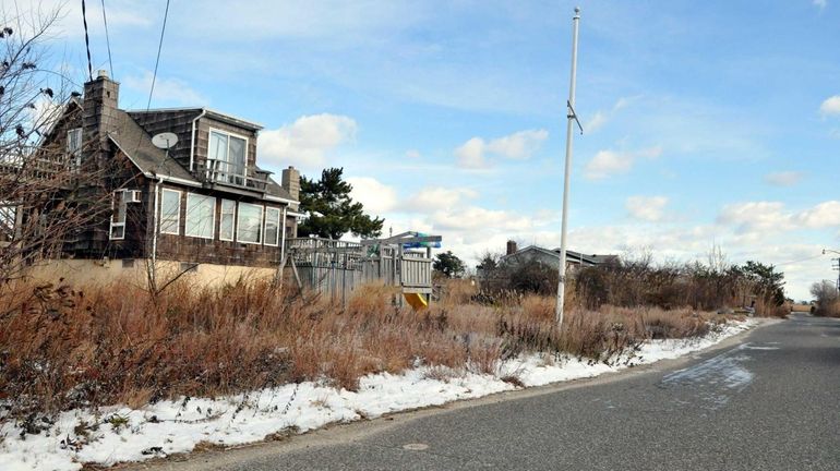 The house at 8 The Fairway on Oak Beach that...