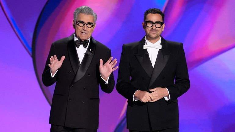 Hosts Eugene Levy, left, and Dan Levy speak during the...