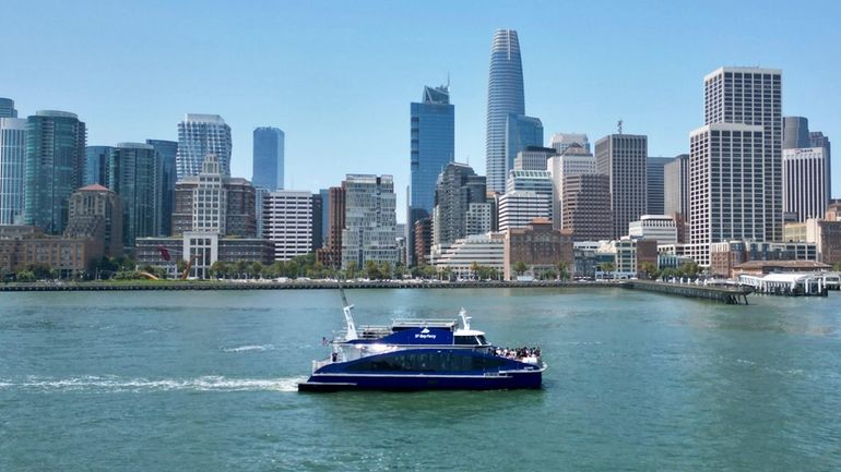 The MV Sea Change, the first commercial passenger ferry powered...