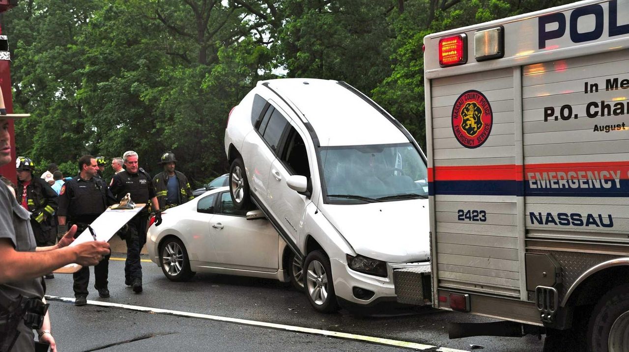 SUV lands on car in Southern State Parkway crash; 3 people injured