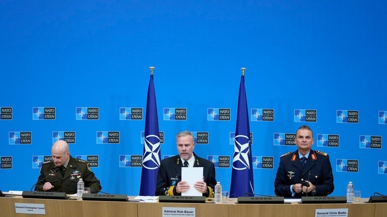 Chair of the NATO Military Committee Admiral Rob Bauer, center,...