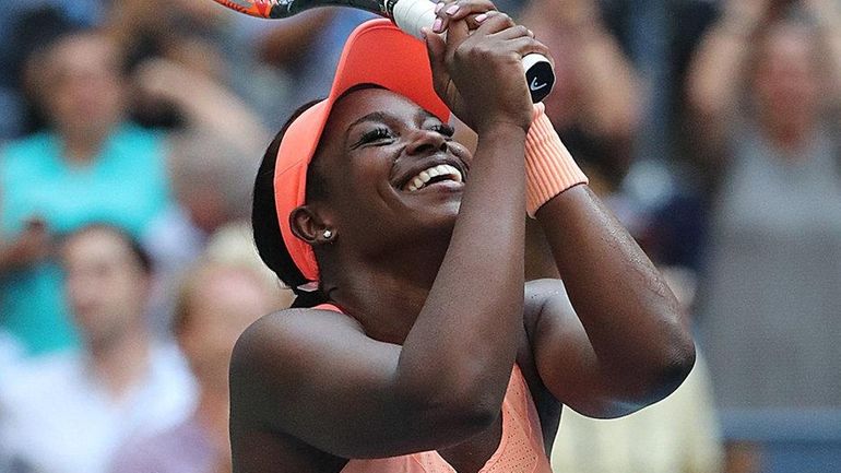 Sloane Stephens reacts after winning a third-set tiebreaker for the...