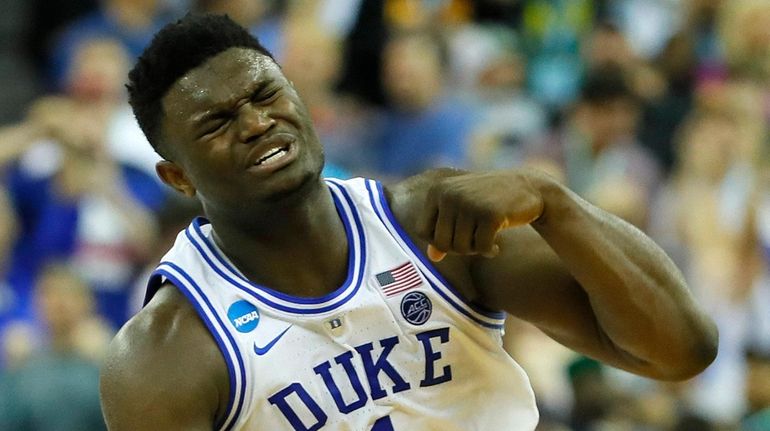 Duke's Zion Williamson  celebrates after Blue Devils defeated the University...