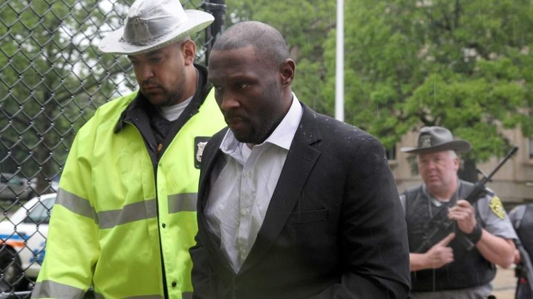 Darrell Fuller arrives at the Nassau County Court in Mineola...