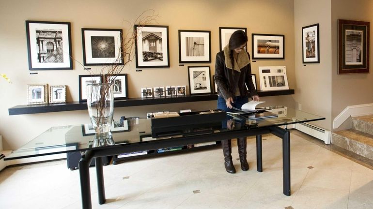 A customer browses through the B.Street LTD Gallery, a family-owed...