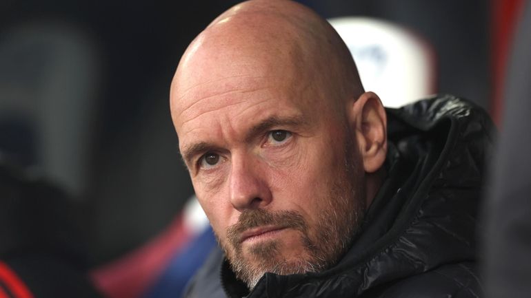 Manchester United's head coach Erik ten Hag waits for the...