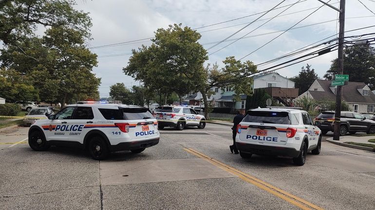 Police work at the scene of the crash in North...