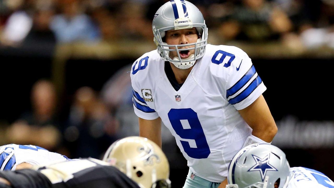 Dallas Cowboys quarterback Tony Romo (9) runs out of the pocket against the  New York Giants in the third quarter in week 1 of the NFL season at MetLife  Stadium in East