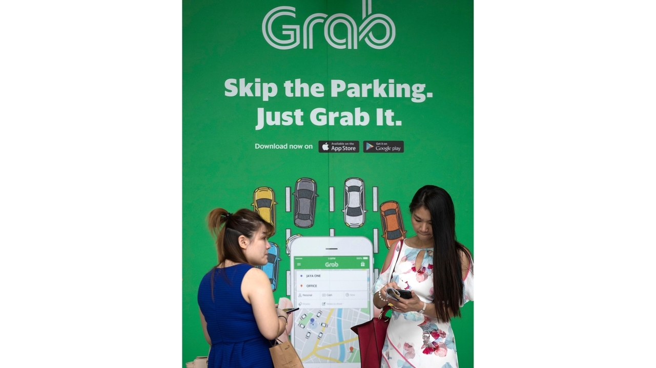 Singapore ride-hailing firm Grab slashes 1,000 jobs in biggest layoff since pandemic - Vimarsana News