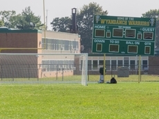 Two parents charged in HS flag football fight
