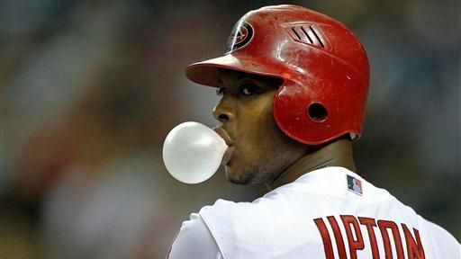 Arizona Diamondbacks outfielder Justin Upton waits on deck during a...