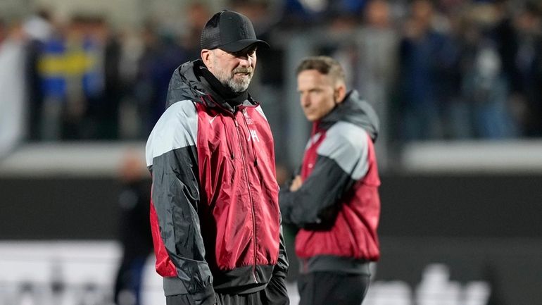 Liverpool's manager Jurgen Klopp walks on the pitch during warmup...