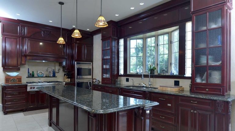 The main kitchen of the Postmodern-style house in Rocky Point,...