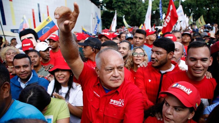 Ruling party leader Diosdado Cabello takes part in a rally...