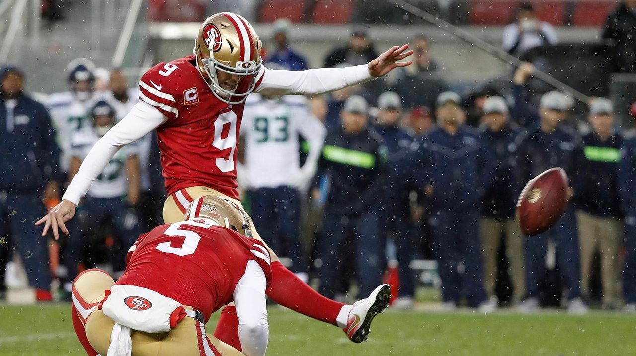 San Francisco 49ers kicker Robbie Gould (9) follows his kick