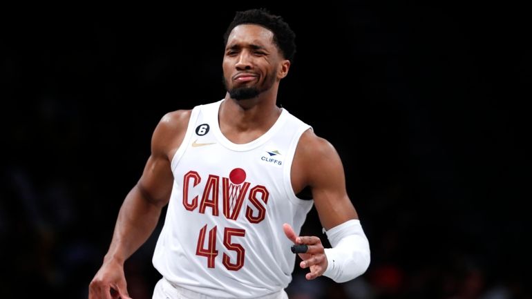 Cleveland Cavaliers guard Donovan Mitchell (45) reacts after making a...