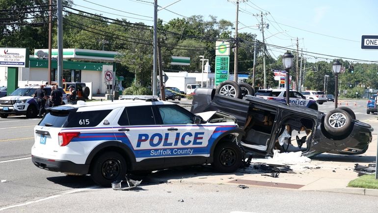 A Suffolk police SUV crashed with another SUV, causing it...