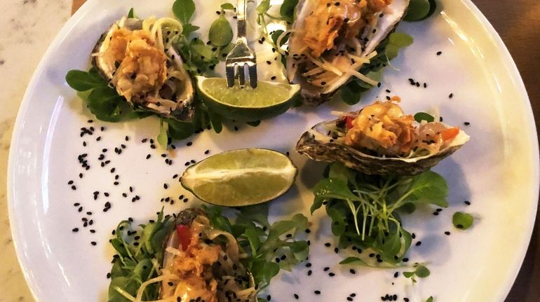 Crispy oysters with Thai green-papaya slaw at NoCo Kitchen Wine and...