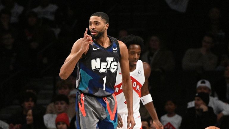 Nets forward Mikal Bridges reacts in the first half of...