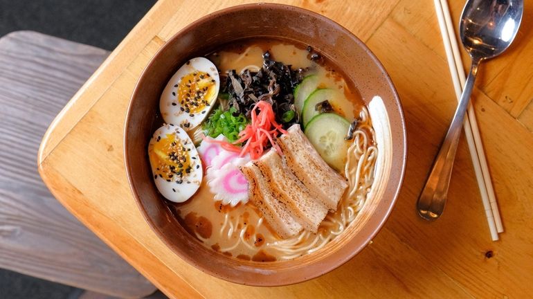 The MB Ramen, a classic tonkotsu broth with pork belly,...