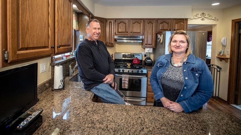 Robert and Christine Budzenski in the kitchen of the Glen...