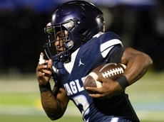 Zy'eare Schulters break through for Eagle Academy II in PSAL football battle