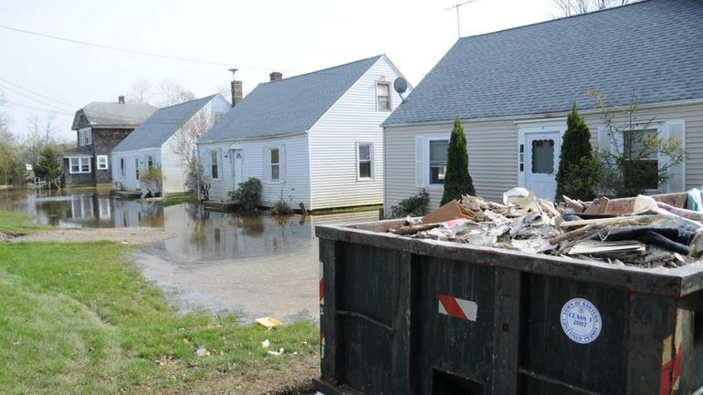 The scene on Horton Avenue in Riverhead continues to show...