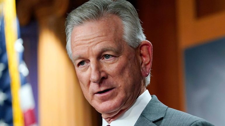 Sen. Tommy Tuberville, R-Ala., listens to a question during a...