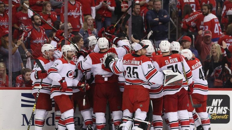 WASHINGTON, DC - APRIL 24: The Carolina Hurricanes celebrate victory...