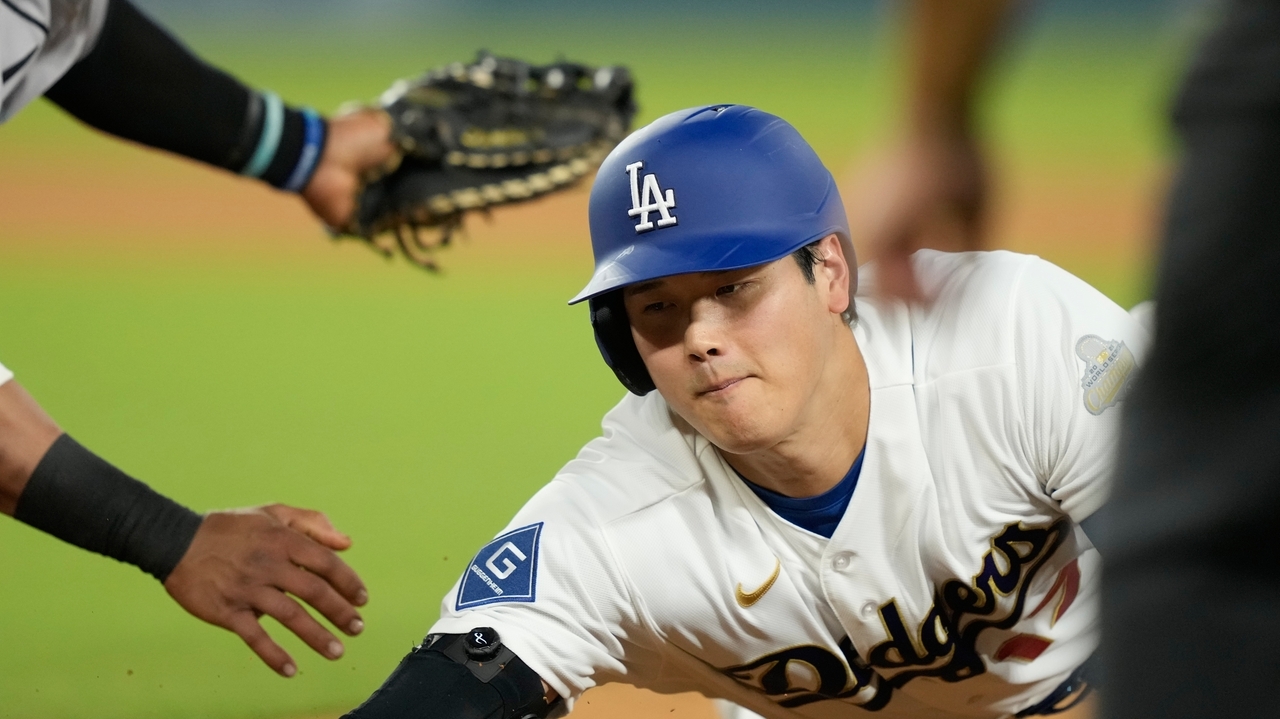 Dodgers open defense of back-to-back World Series titles with a win ...
