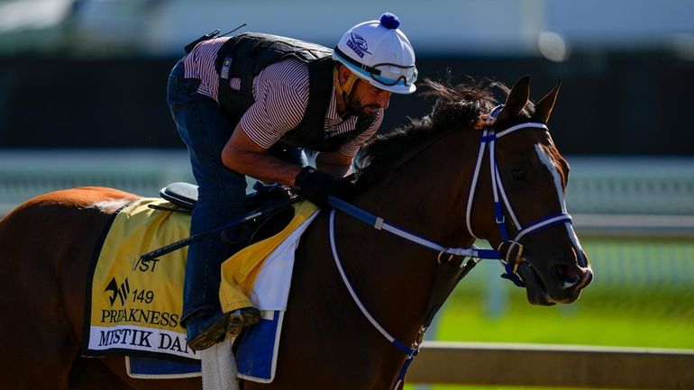 Kentucky Derby winner and Preakness Stakes entrant Mystik Dan works...