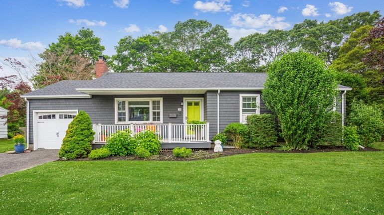 This three-bedroom home in Bellport recently went into contract. It...
