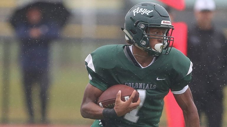 Floyd's LaDuke Harris runs the ball in the second quarter during...