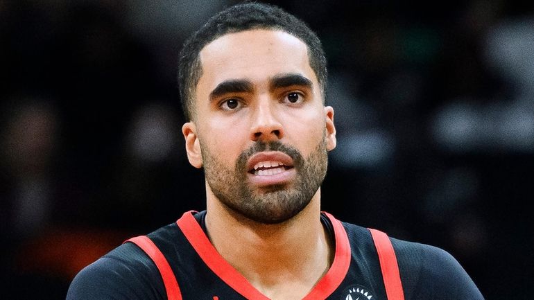 Toronto Raptors forward Jontay Porter looks on during the first...