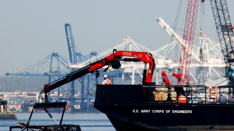 The U.S. Army Corps of Engineers debris removal vessel The...