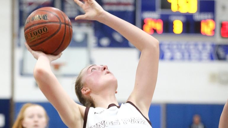 Kings Park's Ryan Currier (24) puts one up in the...