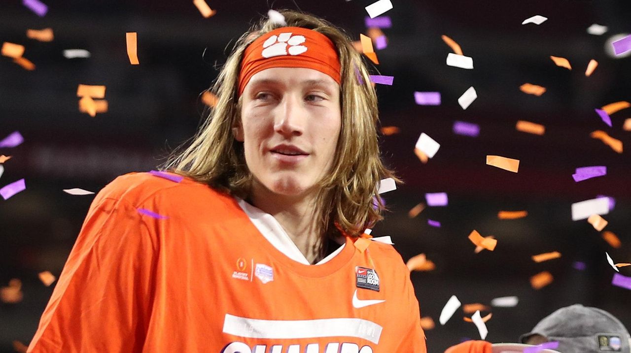 Trevor Lawrence Clemson Tigers Autographed 16 x 20 Orange Jersey Throwing Photograph