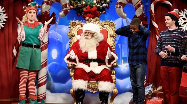 Kate McKinnon as Santa's Elf and Kenan Thompson as Santa...