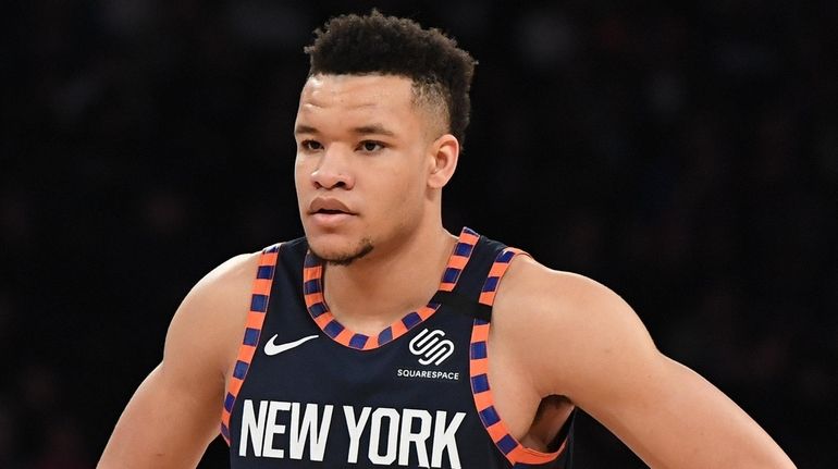 Knicks forward Kevin Knox II looks on against the Heat...