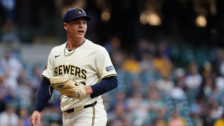 Milwaukee Brewers' Tobias Myers reacts to a defensive play as...