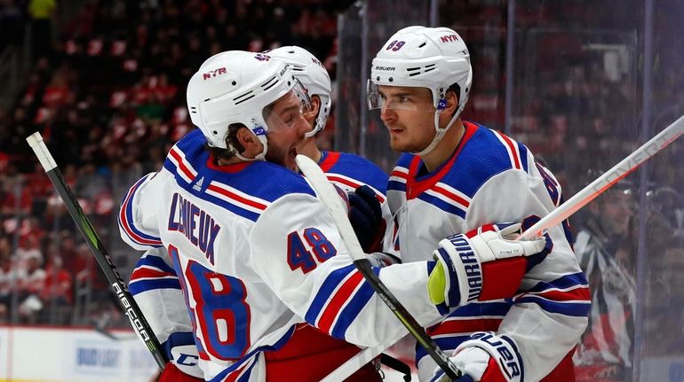 Rangers right wing Pavel Buchnevich, right, celebrates his goal with...