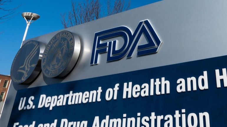 A sign for the U.S. Food and Drug Administration is...