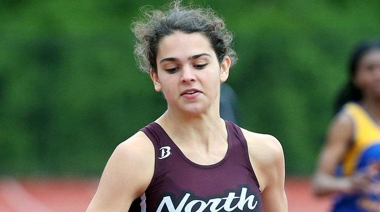 Caroline Reiner of North Shore won the girl's 400 meter...