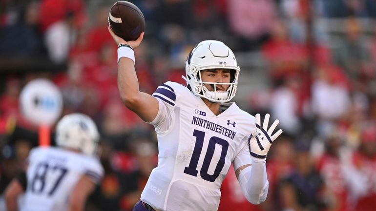 Northwestern quarterback Brendan Sullivan throws against Maryland in the first...