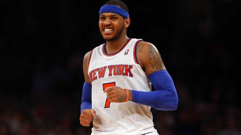 Carmelo Anthony reacts to a missed shot in the second...